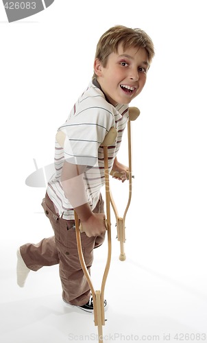 Image of Smiling boy on crutches