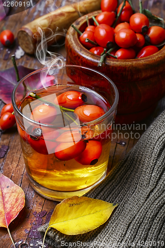 Image of hot tea with berries rose hips