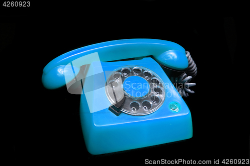 Image of old blue telephone