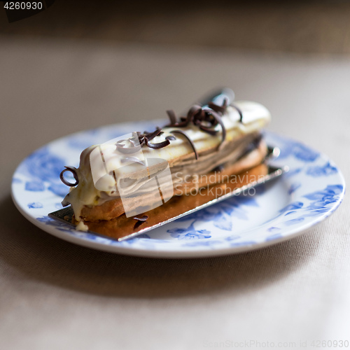 Image of  Chocolate eclair with glaze. selective focus