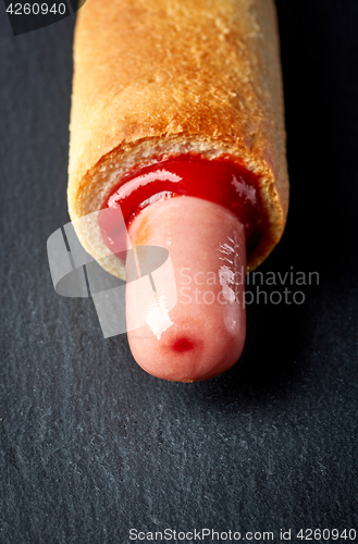 Image of Hotdog with ketchup