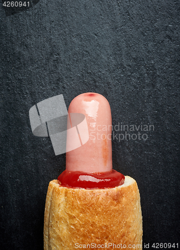 Image of Hotdog with ketchup