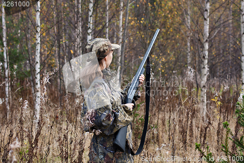 Image of Woman hunter in the forest