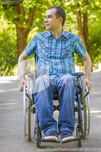 Image of young man in wheelchair