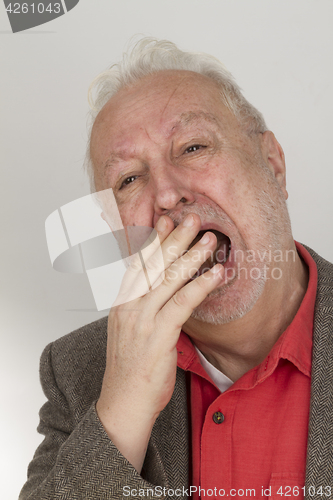 Image of Bearded man yawning