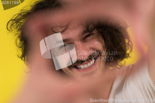 Image of young man with funny hair over color background