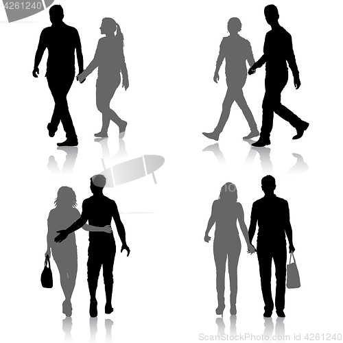 Image of Set Silhouette man and woman walking hand in hand