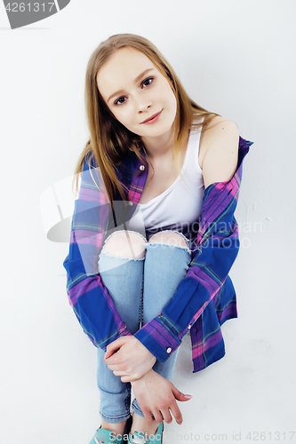 Image of young pretty teenage hipster girl posing emotional happy smiling on white background, lifestyle people concept 
