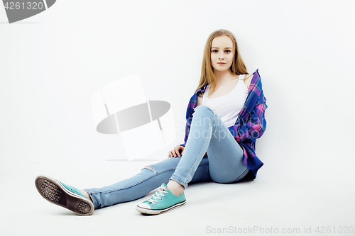 Image of young pretty teenage hipster girl posing emotional happy smiling on white background, lifestyle people concept 