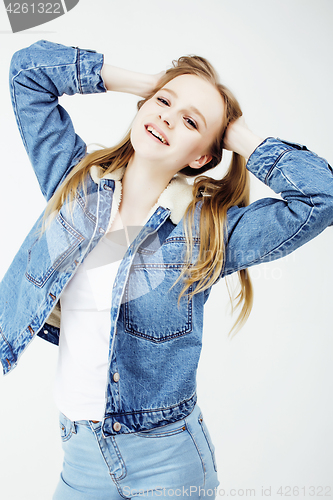 Image of young pretty teenage hipster girl posing emotional happy smiling on white background, lifestyle people concept 