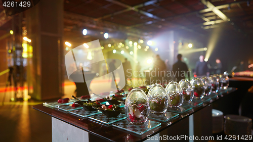 Image of Beautifully decorated catering banquet table with different food snacks.