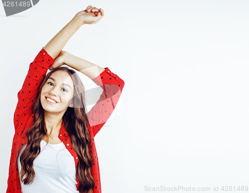 Image of young pretty teenage hipster girl posing emotional happy smiling