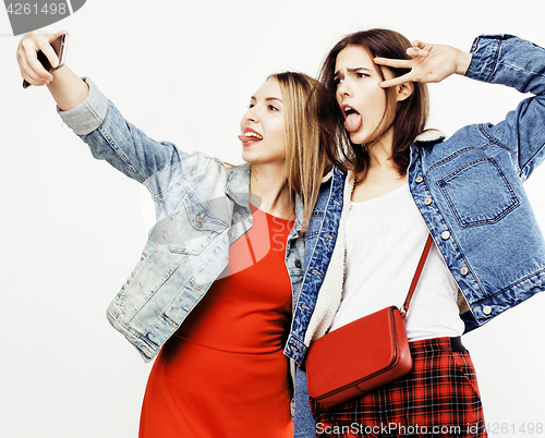 Image of best friends teenage girls together having fun, posing emotional on white background, besties happy smiling, lifestyle people concept close up