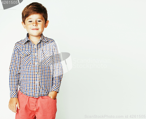 Image of little cute adorable boy posing gesturing cheerful on white back