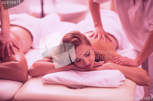 Image of couple receiving a back massage