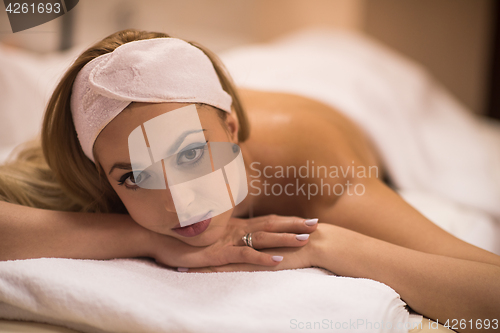 Image of woman laying on massage table