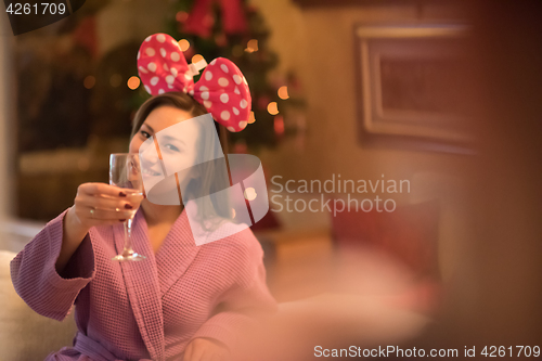 Image of woman drinking champagne at spa