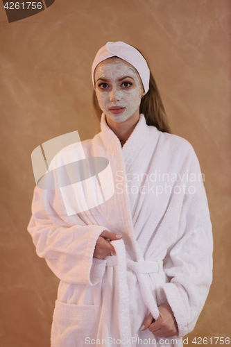 Image of Spa Woman applying Facial Mask