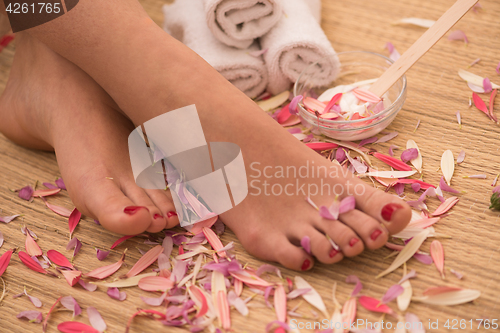 Image of female feet at spa salon