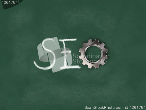 Image of the word seo and gear wheel on chalkboard - 3d rendering