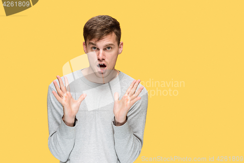 Image of The young man smiling and looking at camera