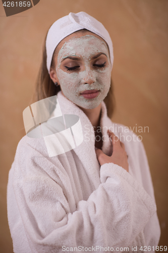 Image of Spa Woman applying Facial Mask