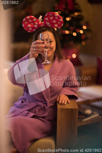 Image of woman drinking champagne at spa