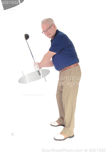 Image of Senior practicing golf at home.