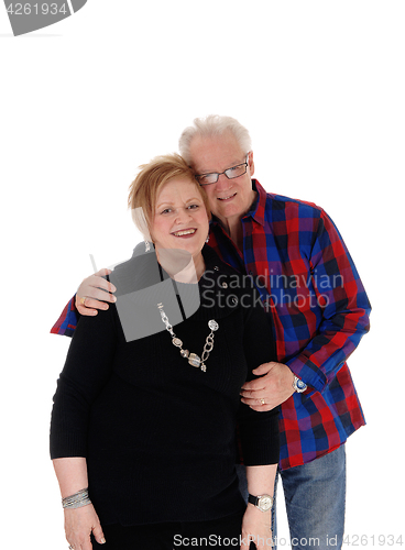 Image of Lovely senior couple hugging.