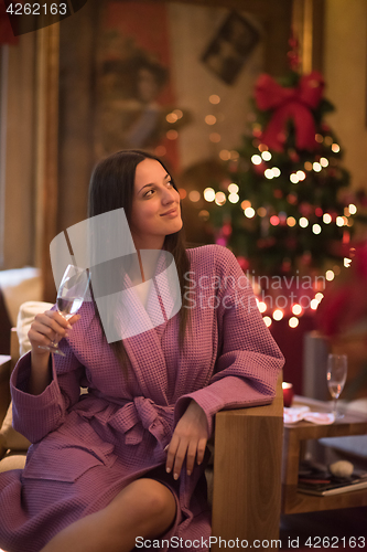 Image of woman drinking champagne at spa