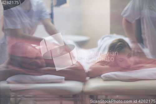 Image of couple receiving a back massage