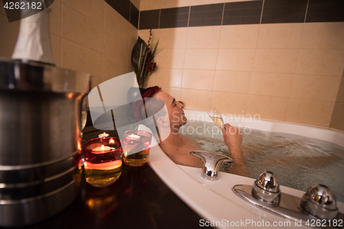 Image of man relaxing in the jacuzzi