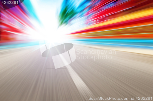 Image of driving on high speed in empty road