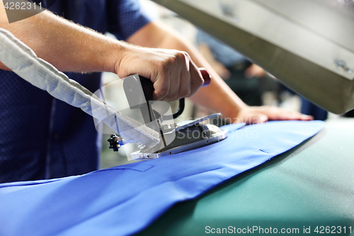 Image of Steam iron. Ironing steam. Steam generator.