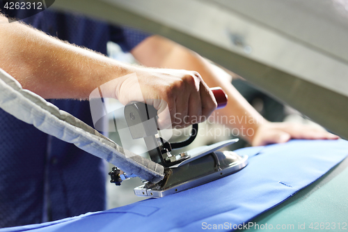 Image of Steam iron. Ironing steam. Steam generator.