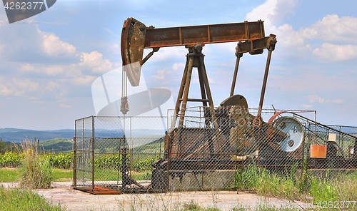 Image of Oil well on a landscape