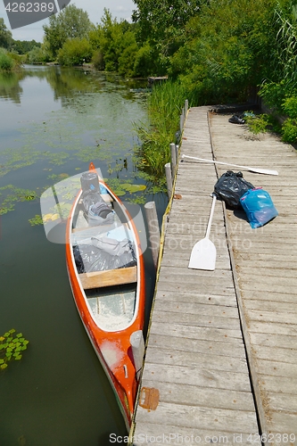 Image of Canoe on the riverside