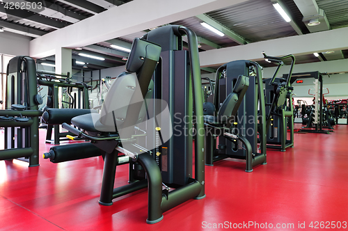 Image of Modern gym interior with equipment