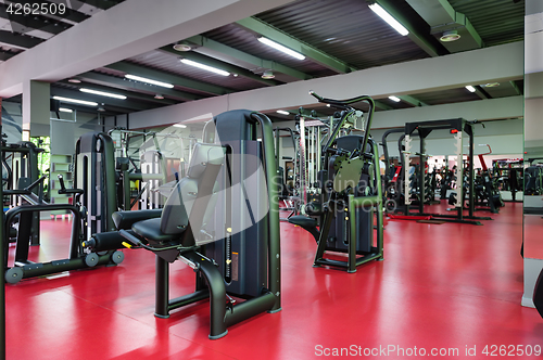 Image of Modern gym interior with equipment