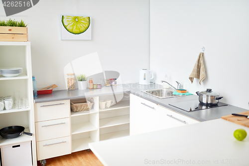 Image of modern home kitchen interior with food on table