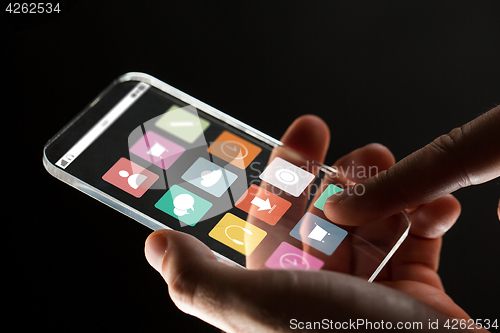 Image of close up of businessman hand with glass smartphone