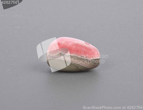 Image of Red tourmaline chain on gray background