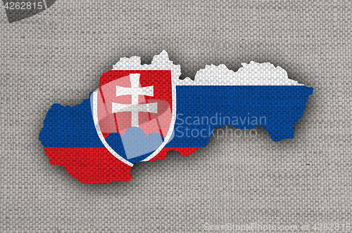 Image of Map and flag of Slovakia on old linen