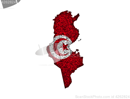 Image of Map and flag of Tunisia on poppy seeds