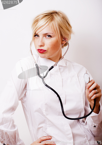 Image of young pretty woman doctor with stethoscope on white background i