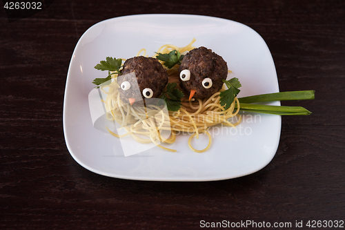 Image of Funny meatballs with pasta