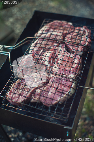 Image of Grilling fresh entrecote pork