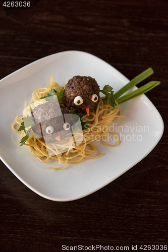 Image of Funny meatballs with pasta