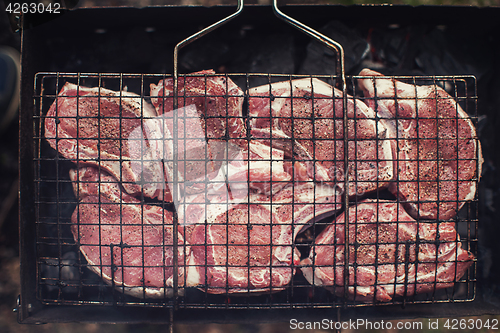 Image of Grilling fresh entrecote pork