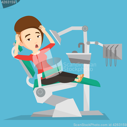 Image of Scared patient in dental chair vector illustration